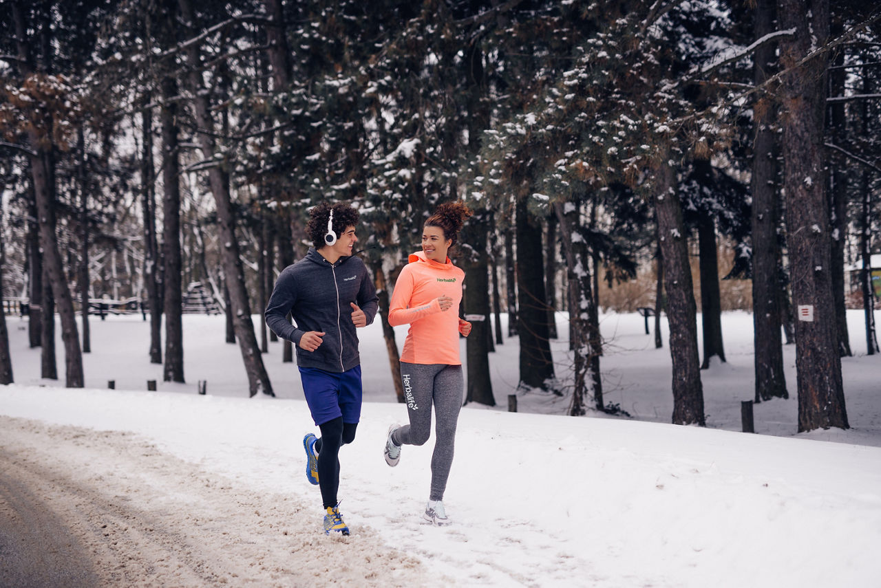 Couple jogging winter