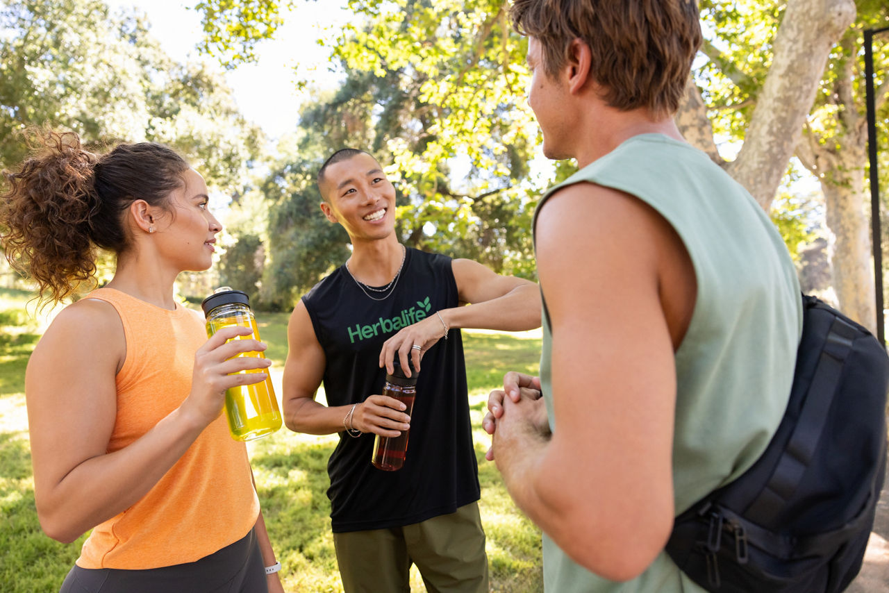 Group of friends relaxing and chatting after their yoga workout