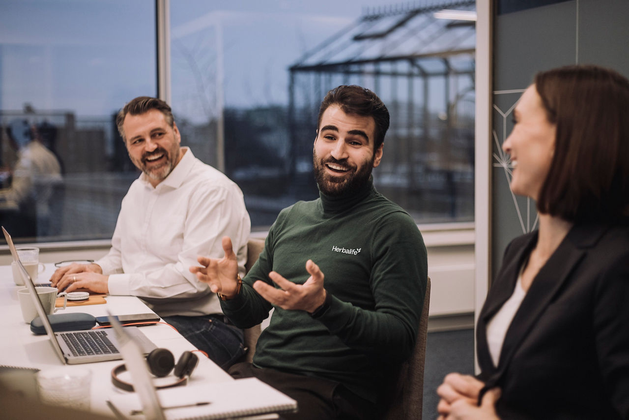 People sharing a presentation