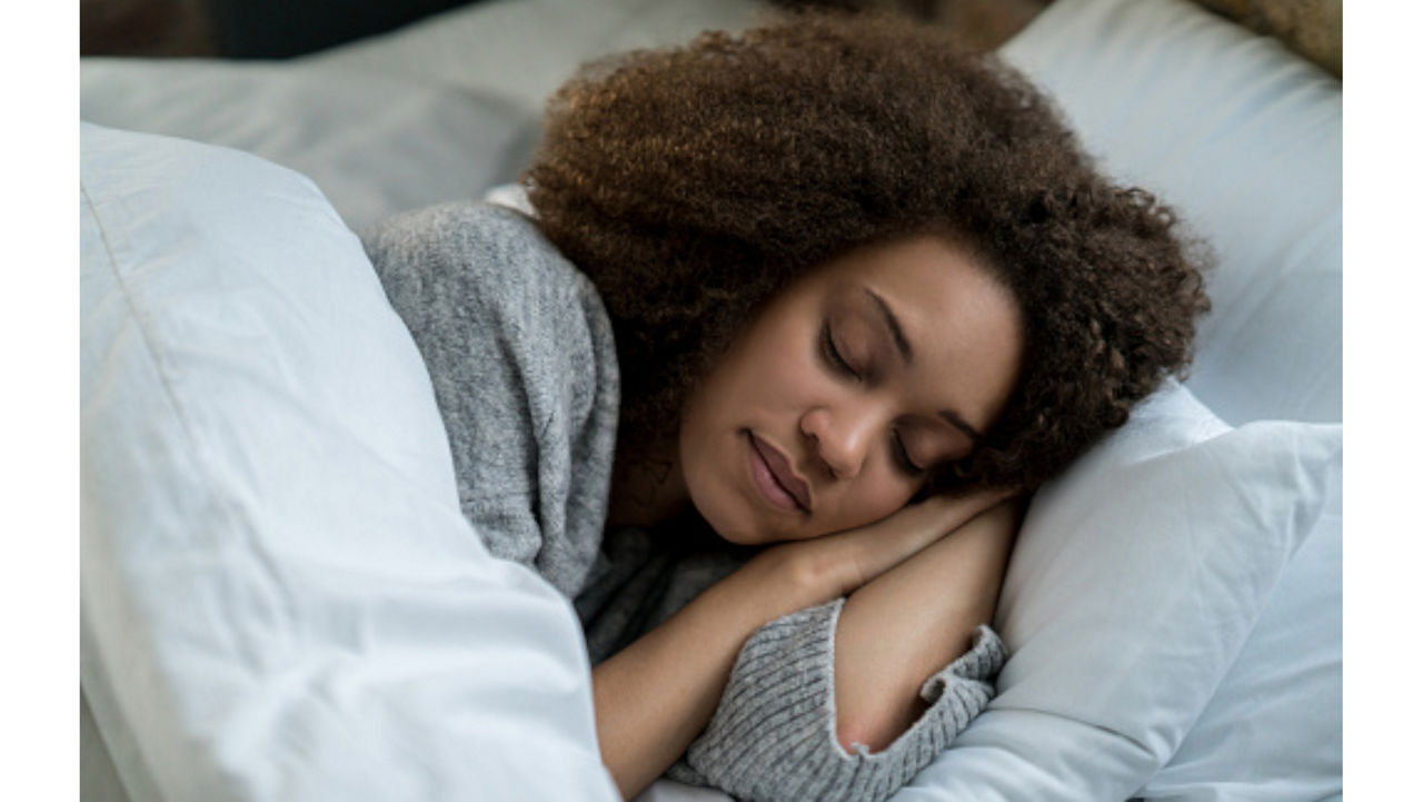 A woman asleep in bed