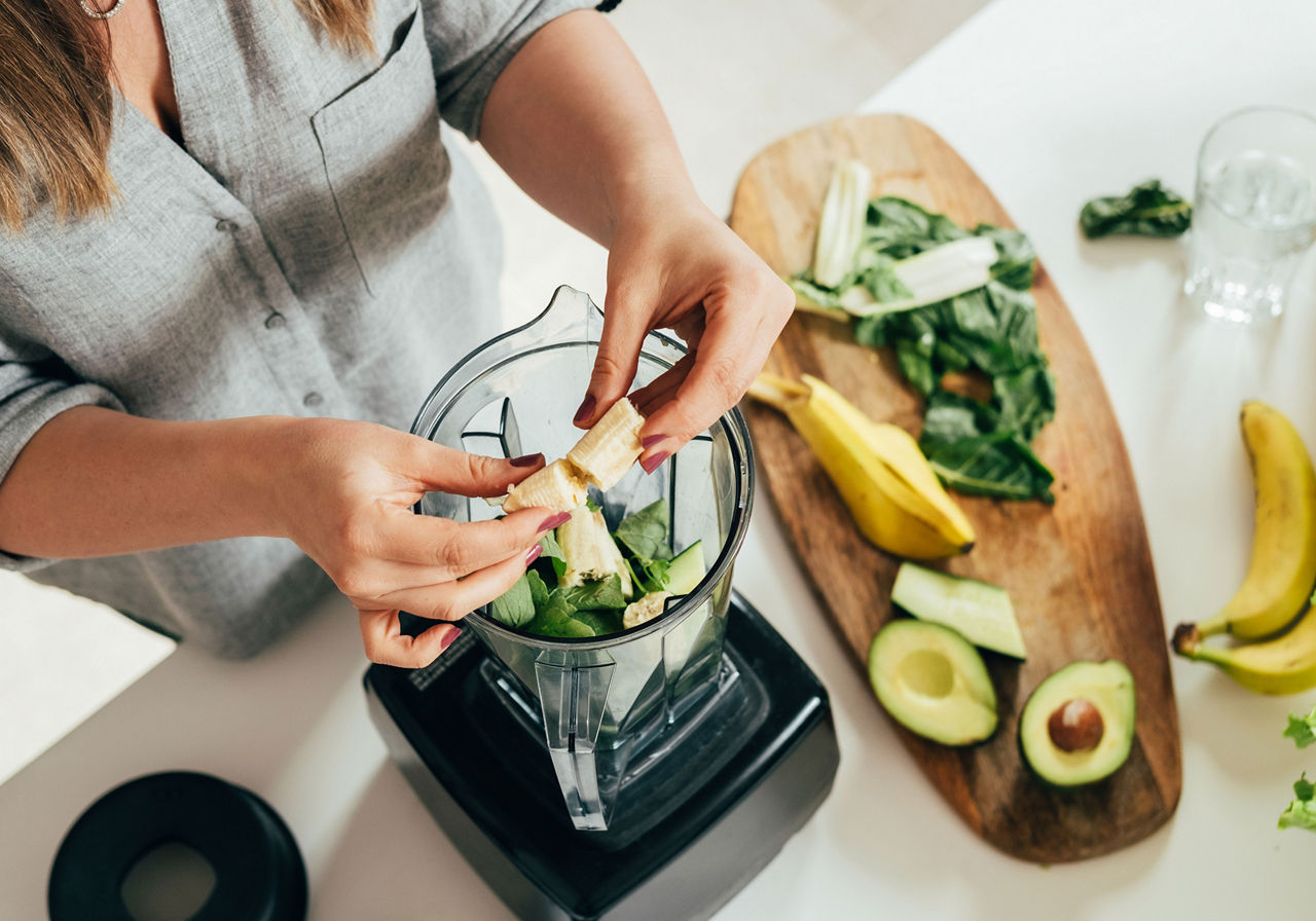 Woman making smoothie