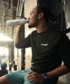 Man drinking beverage gym